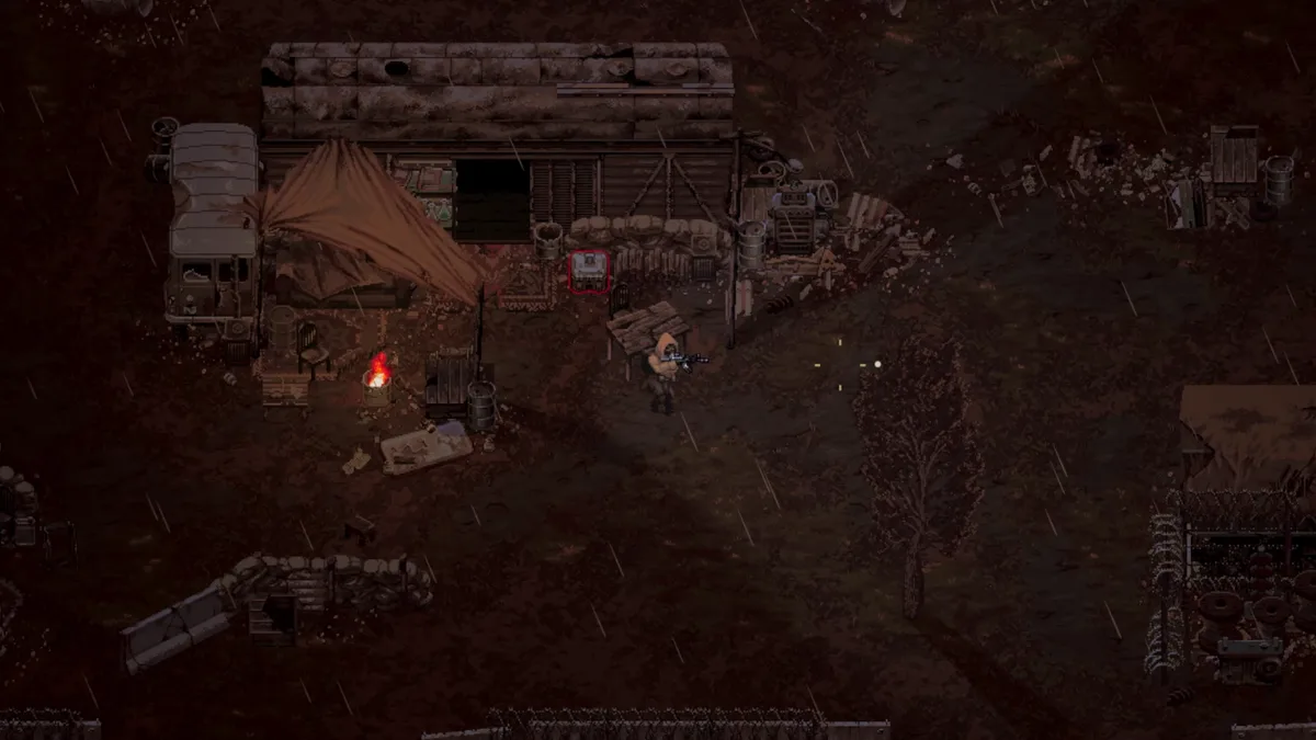 Scavland player character on a dirt path in an overgrown field, a concrete bunker-like ruin with a dark doorway in the upper left — official in-game screenshot